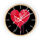 Wall clock with a red heart and 'be kind' text on a black background