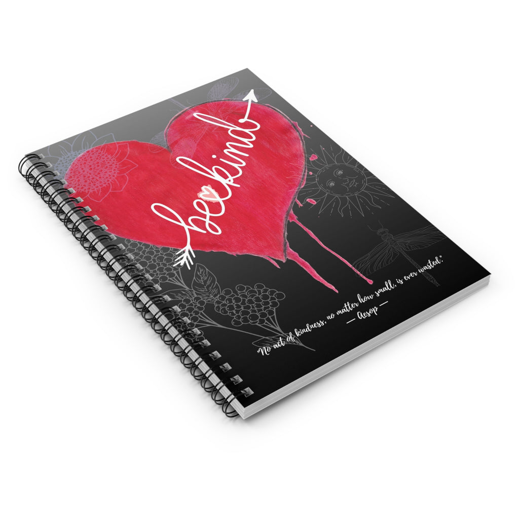 Notebook with a red heart and white text on a black background