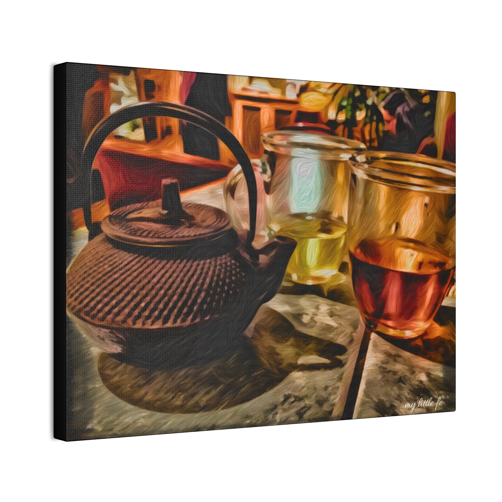 Teapot and glasses on a wooden surface with a blurred background
