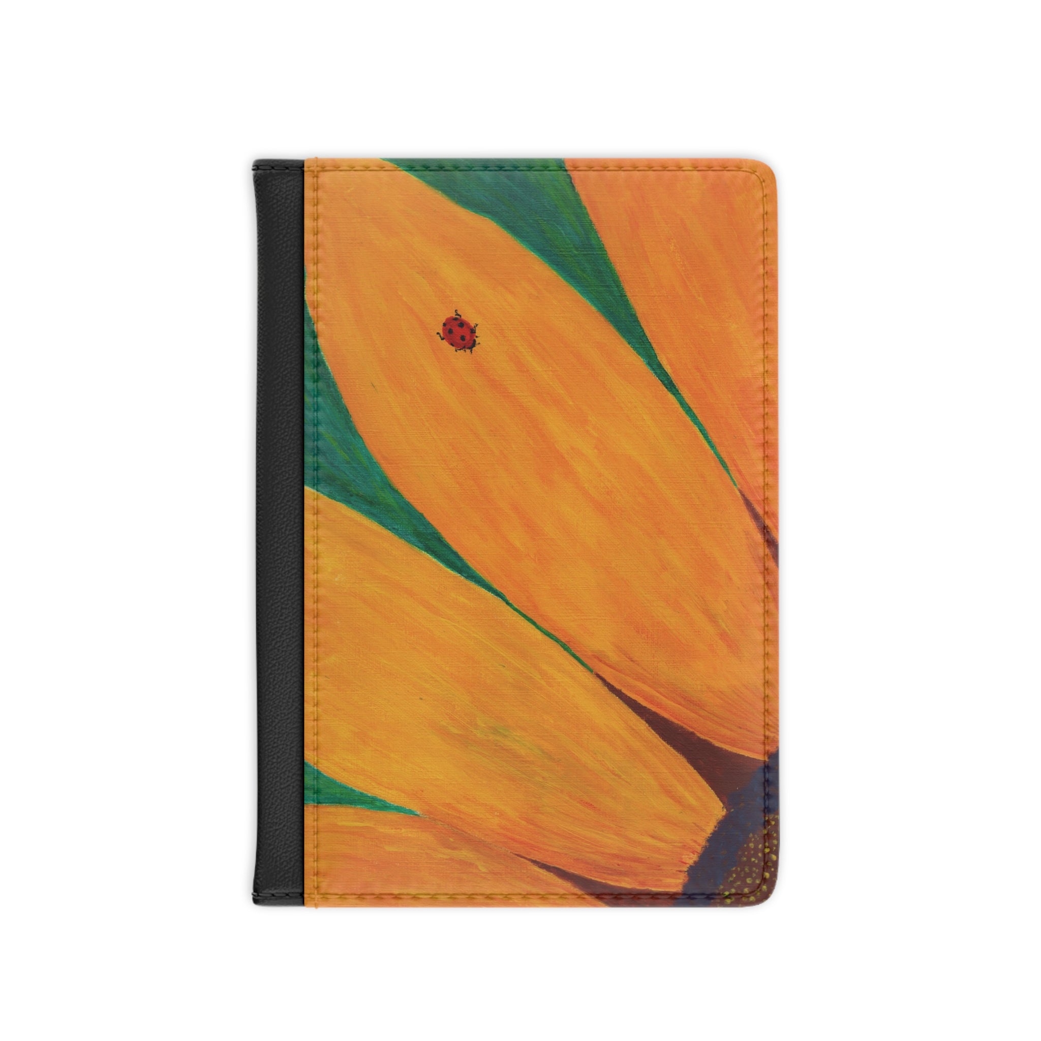 Notebook cover with sunflower petals and a ladybug on a white background