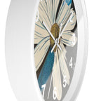 Wall clock with floral design on a white background