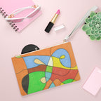 Colorful abstract-patterned pouch with makeup items on a pink background