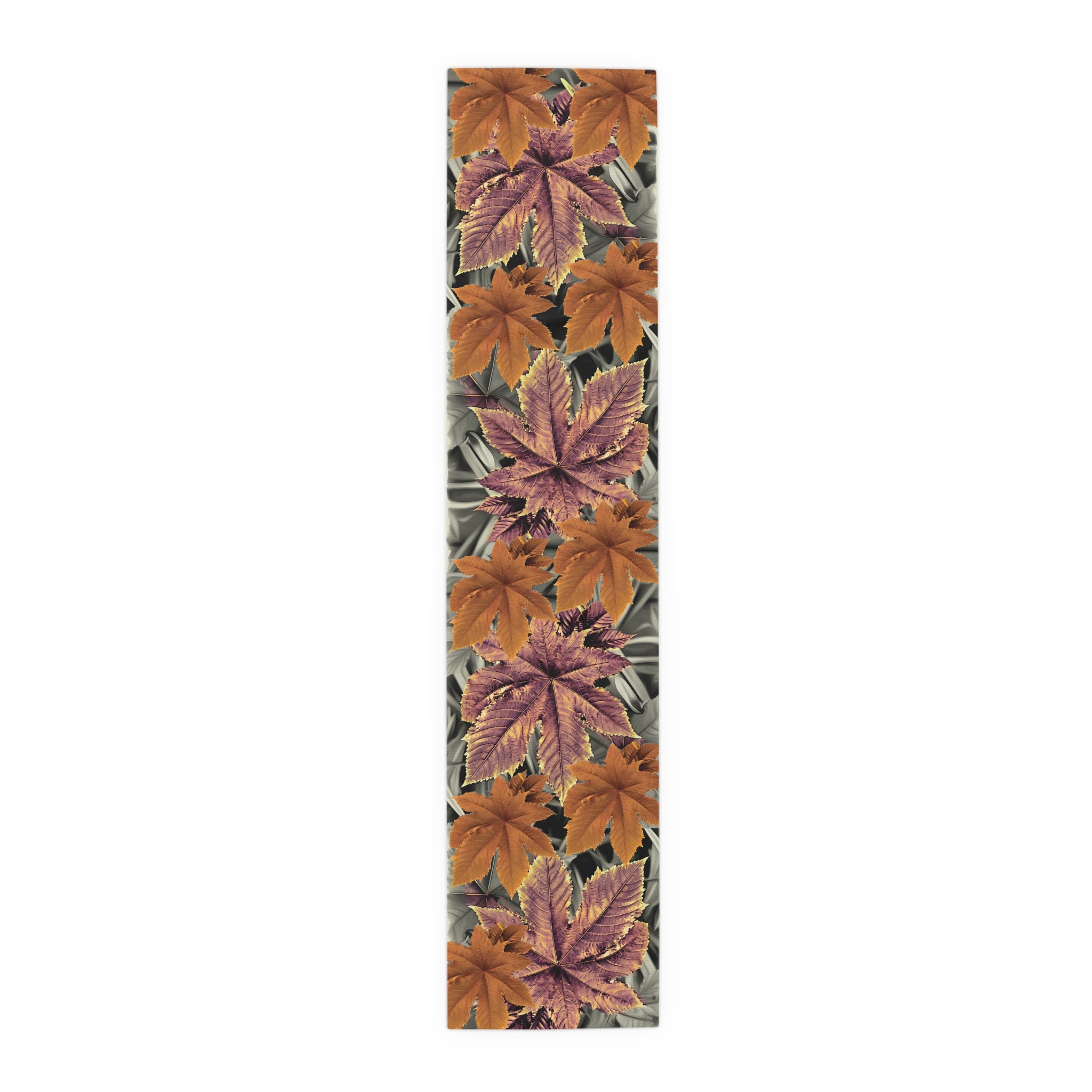 Table runner with autumn leaf pattern on a white background