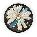 Wall clock with a floral design on a white background