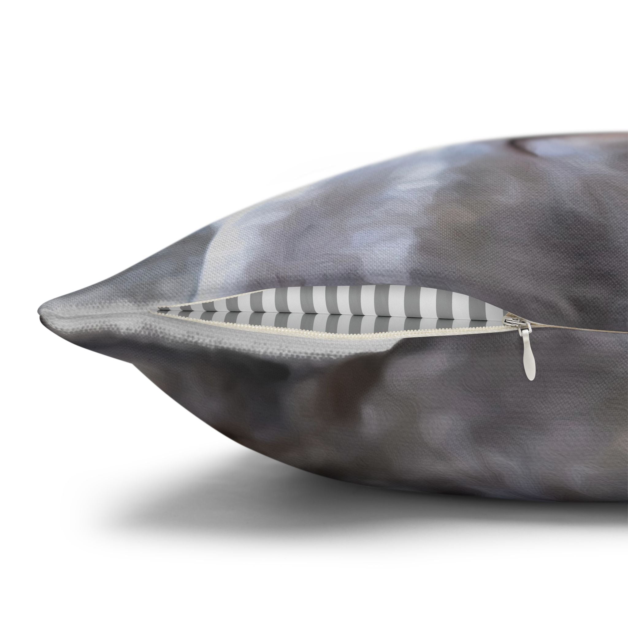 Gray pillow with zipper on a white background