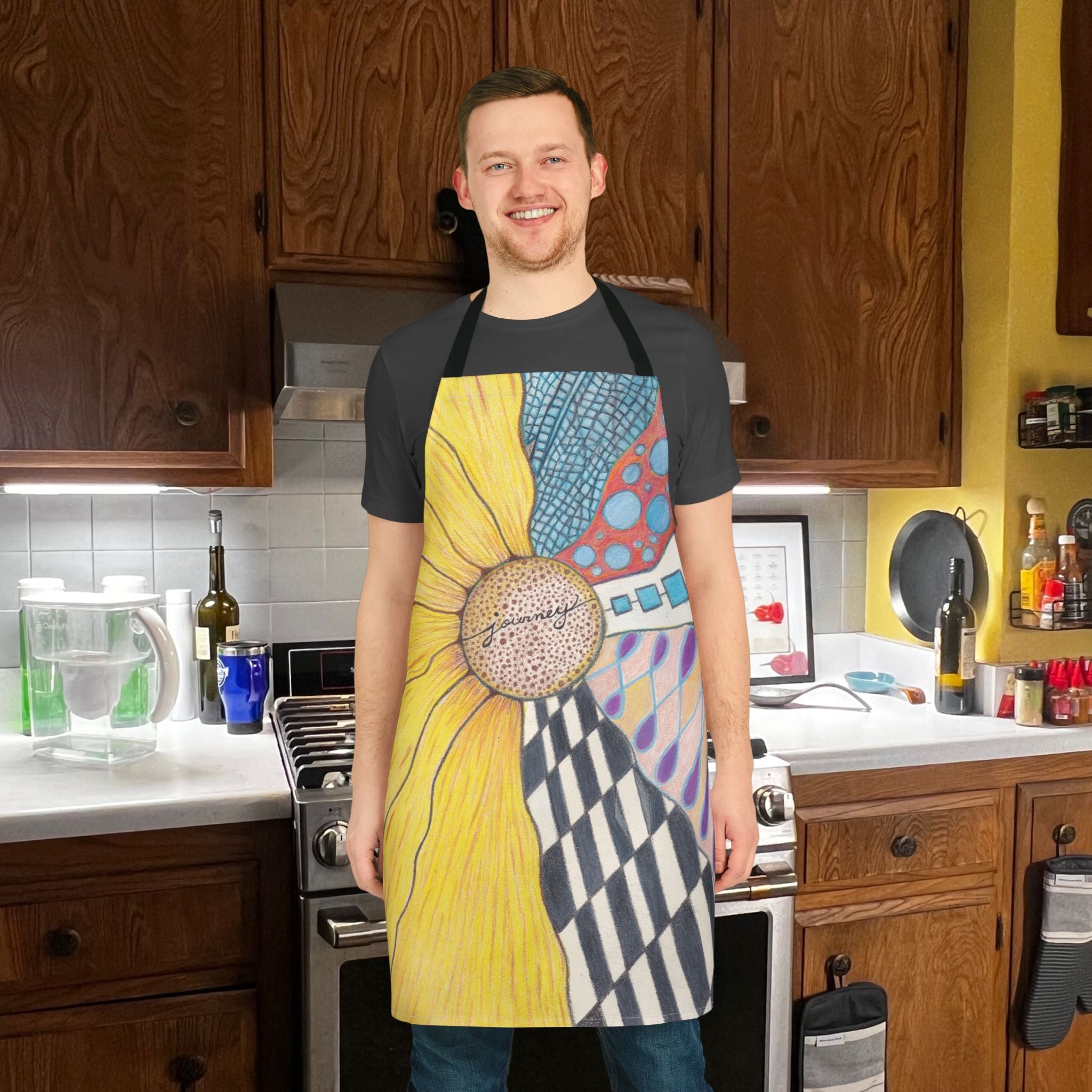 Person wearing a colorful apron in a kitchen