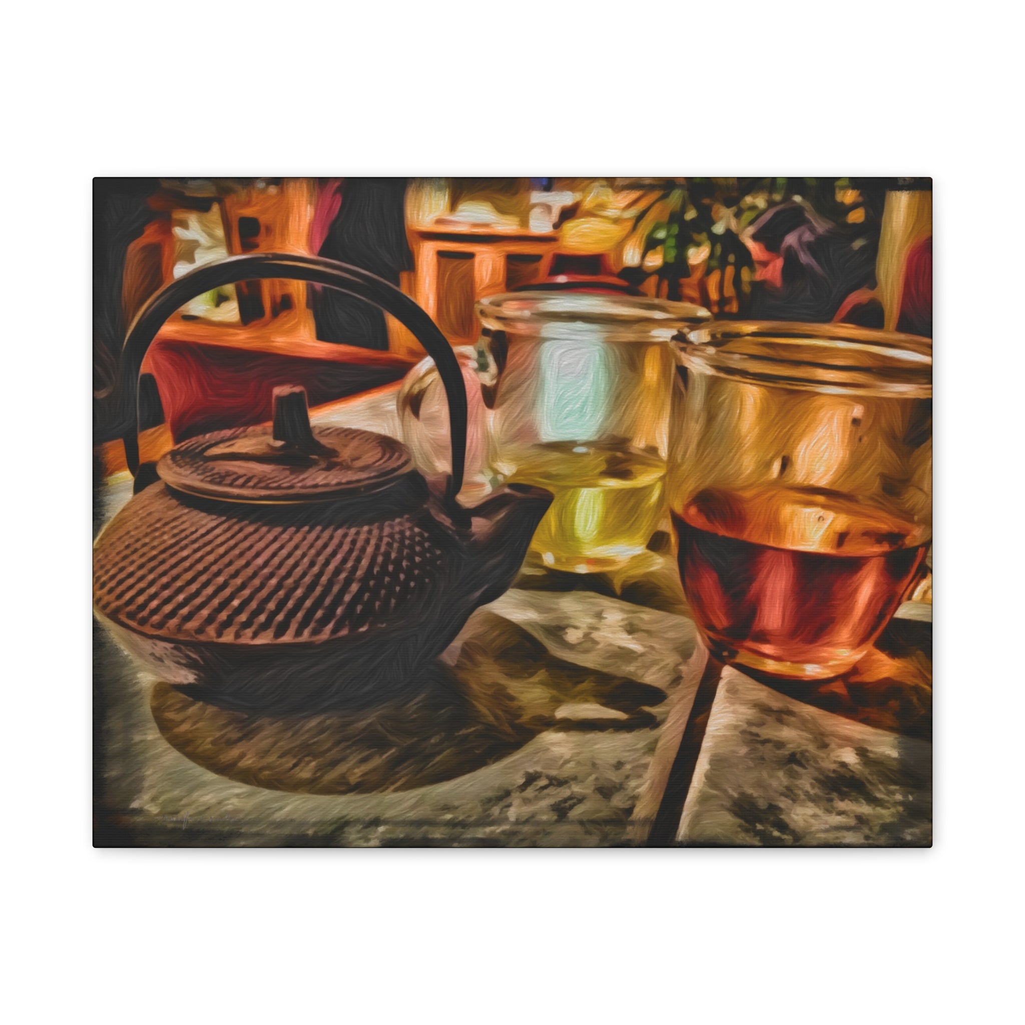 Tea pot and glasses on a table with a blurred restaurant background