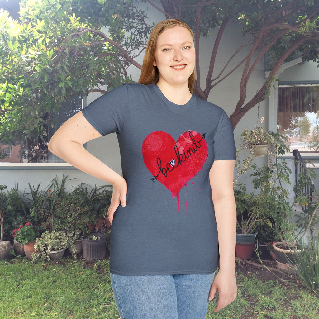 Person wearing a t-shirt with a red heart design outdoors