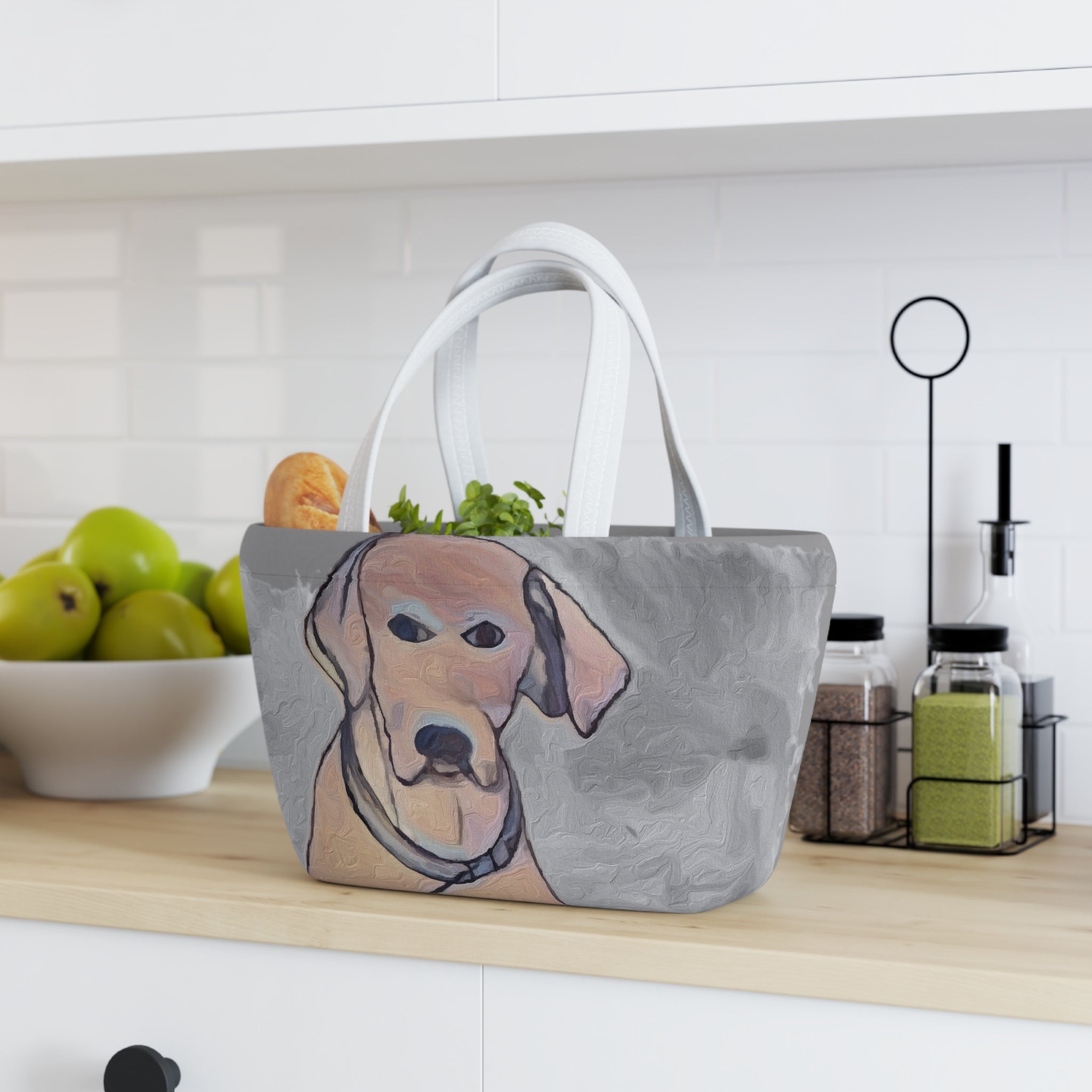 Gray tote bag with a dog illustration on a kitchen counter