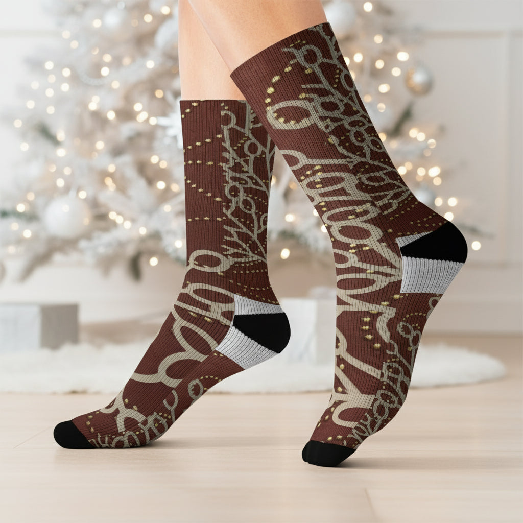 Brown patterned socks worn by a person on a white background