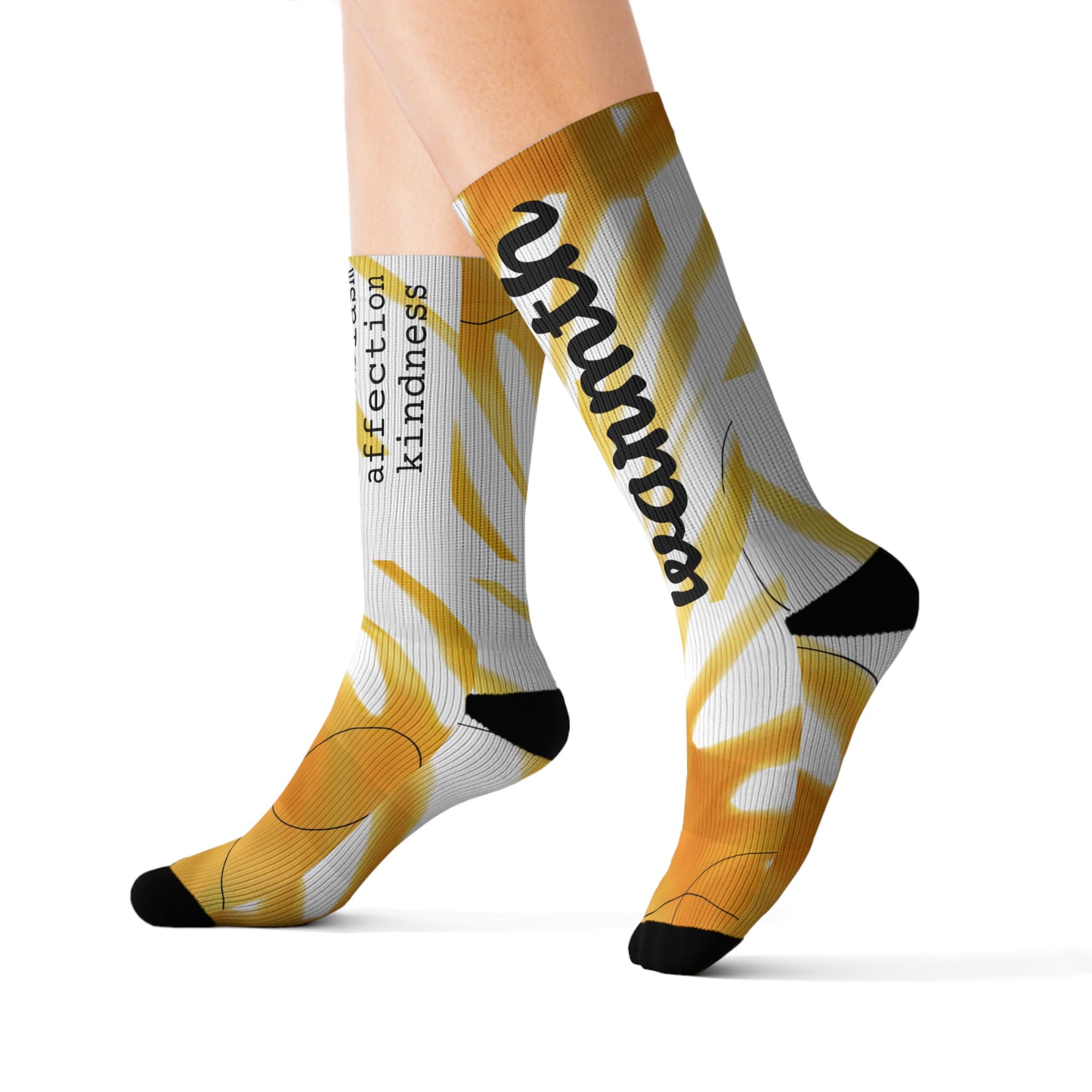 Yellow and white socks with text on a white background