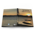 Open book showing a sunset over water with a boat, text 'My favorite color is sunset', and a palm tree.