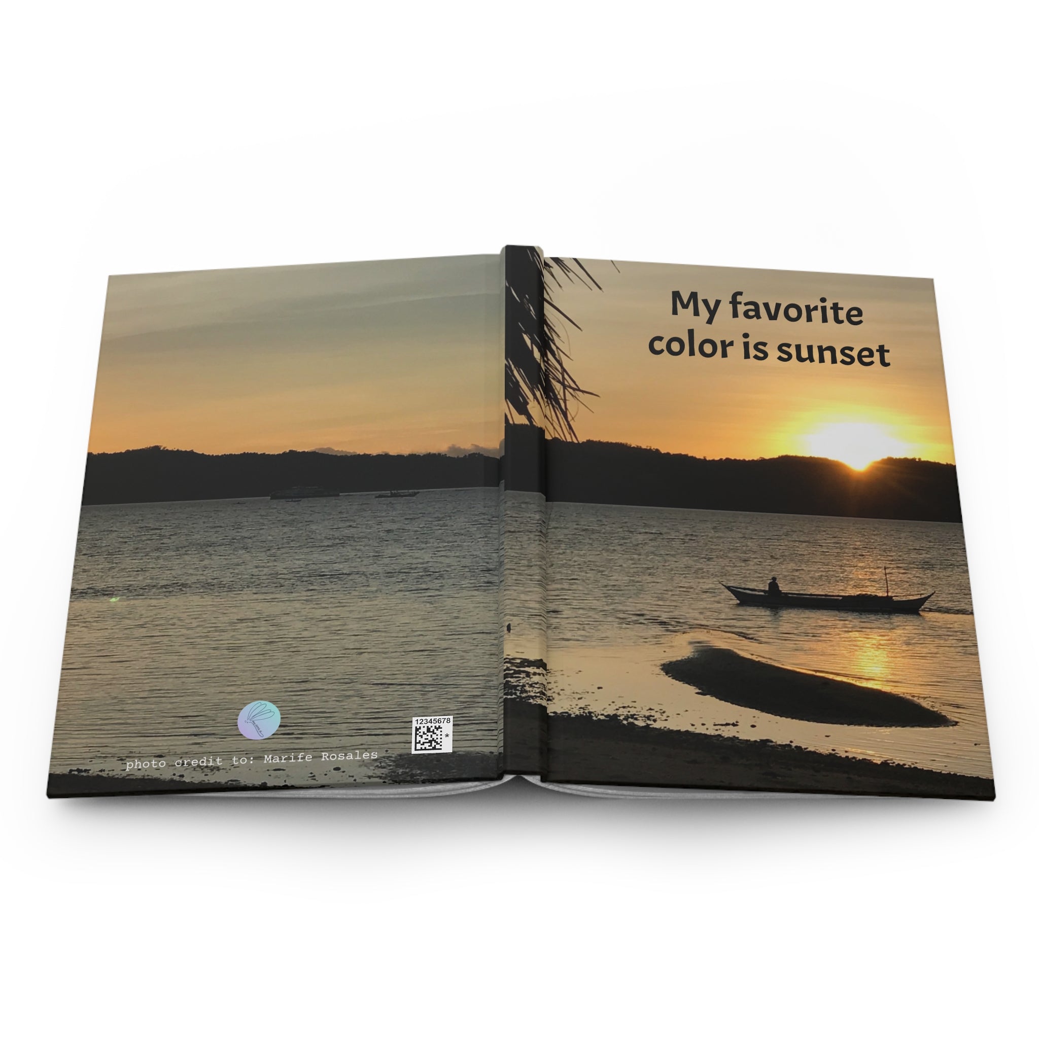 Open book showing a sunset over water with a boat, text 'My favorite color is sunset', and a palm tree.