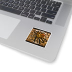 Laptop with a sticker on the palm rest area featuring a spider and text.