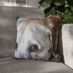 Pillow with a dog's face on a gray couch