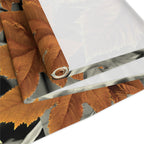 Roll of brown paper with a knife on a white background
