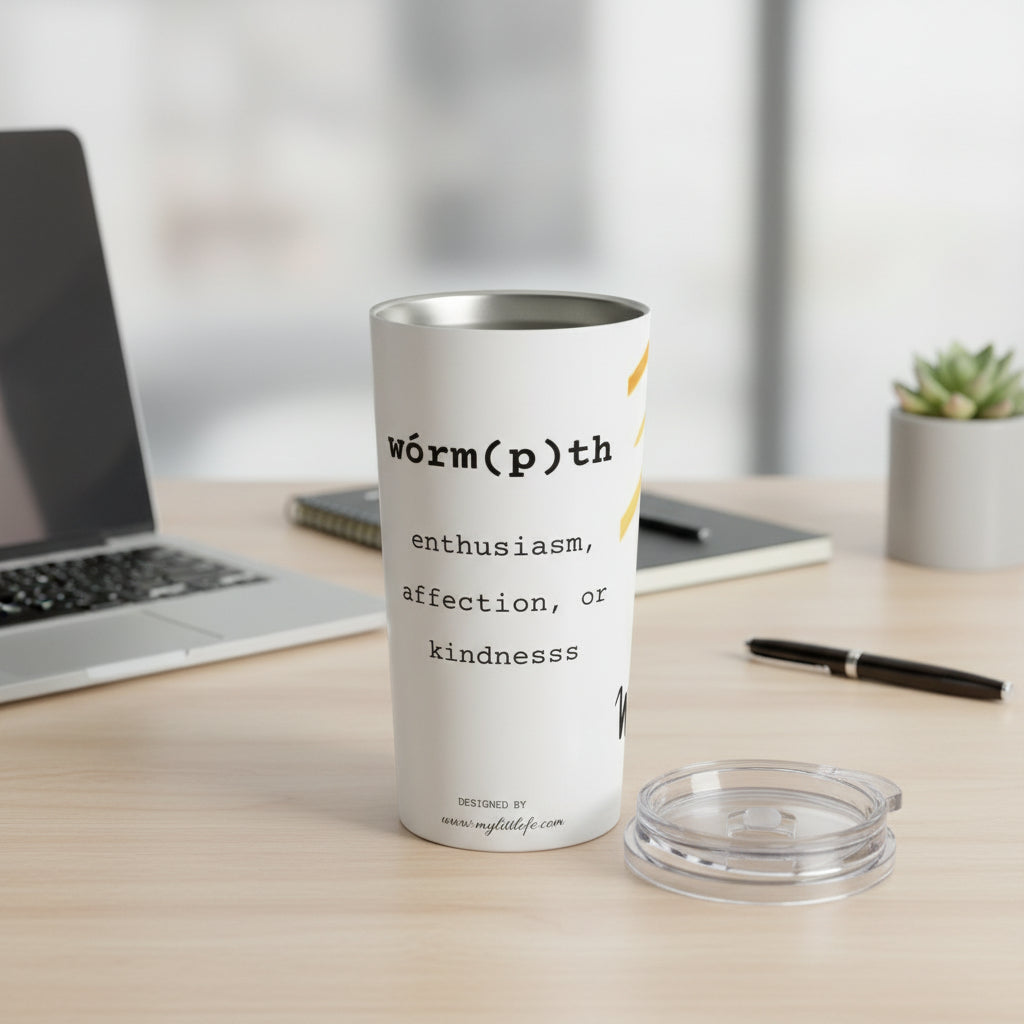 Tumbler with definition text on an office desk