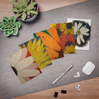 5 greeting cards with different floral design on a desk with pen, succulent, earbugd and binder clips