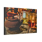 Tea set with a teapot and two glasses on a wooden surface.
