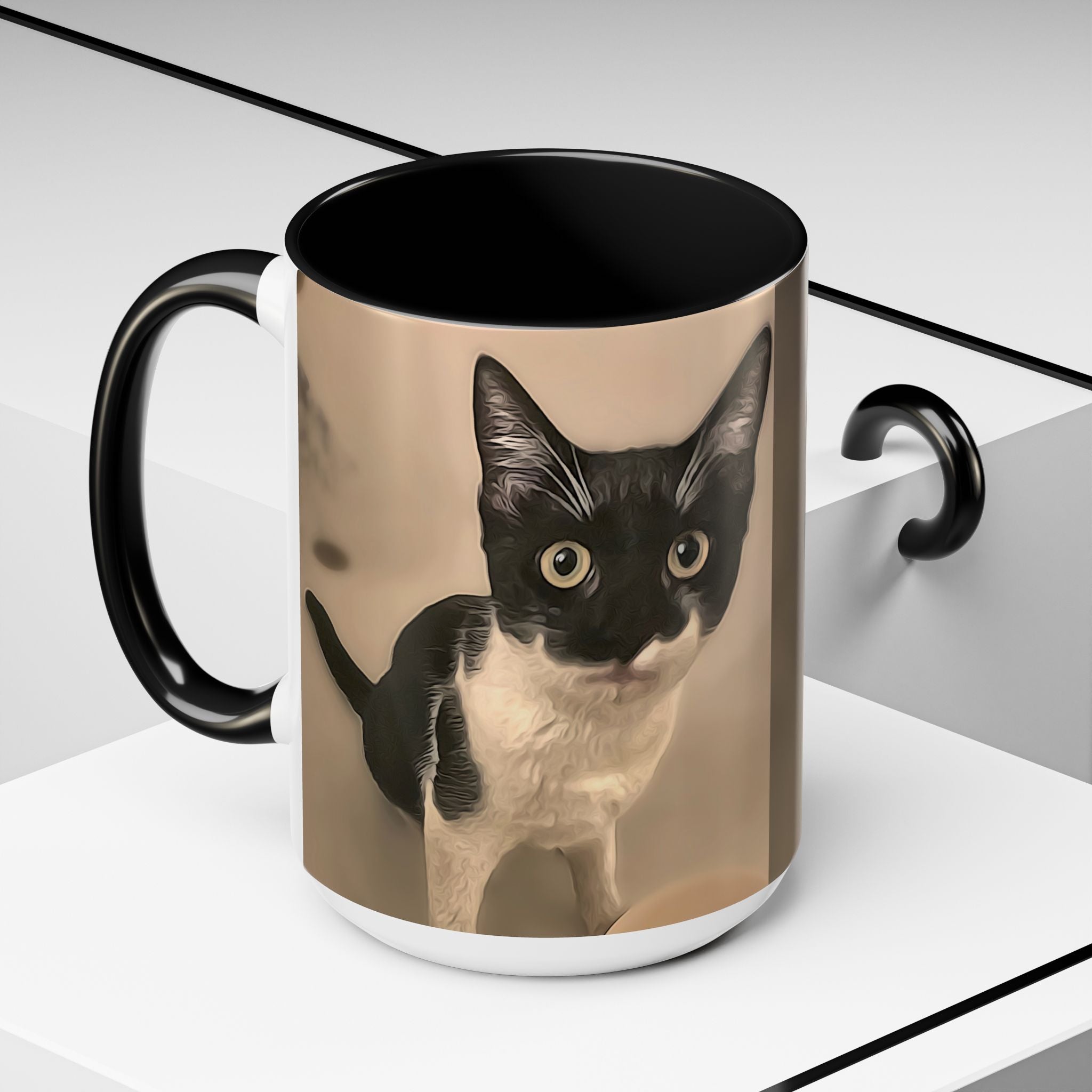 Mug with a black and white cat design on a white surface