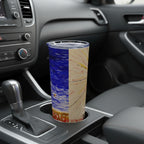 Tumbler with a colorful design inside a car in a cup holder.