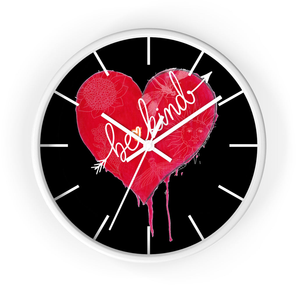 Wall clock with a red heart design and 'be kind' text on a black background