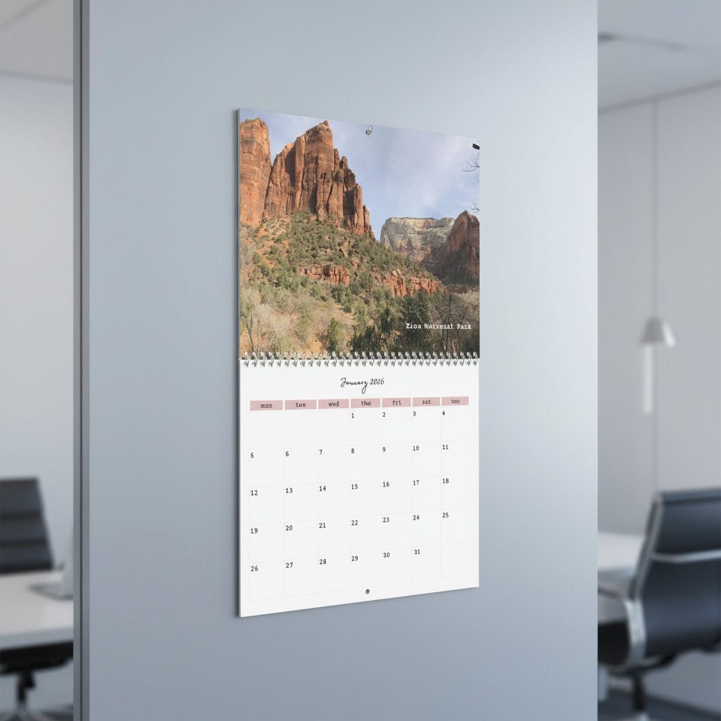 Calendar with a scenic view of Zion National Park on the cover in an office setting