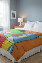 Comforter with Abstract color block design in a cool toned bedroom
