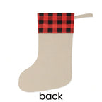 Natural linen back of the Christmas stocking with a red-and-black plaid cuff and hanging loop
