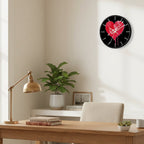 Wall clock with a red heart and 'be kind' text on a home office settig