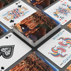 Bryce Canyon Thor's Hammer playing cards spread on dark surface showing card backs and joker -- original photo art poker deck by MyLittleFe.