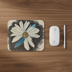 Daisy Dragonfly Wings as Petals design on a mouse pad with a mouse and a stylus pen next to it.