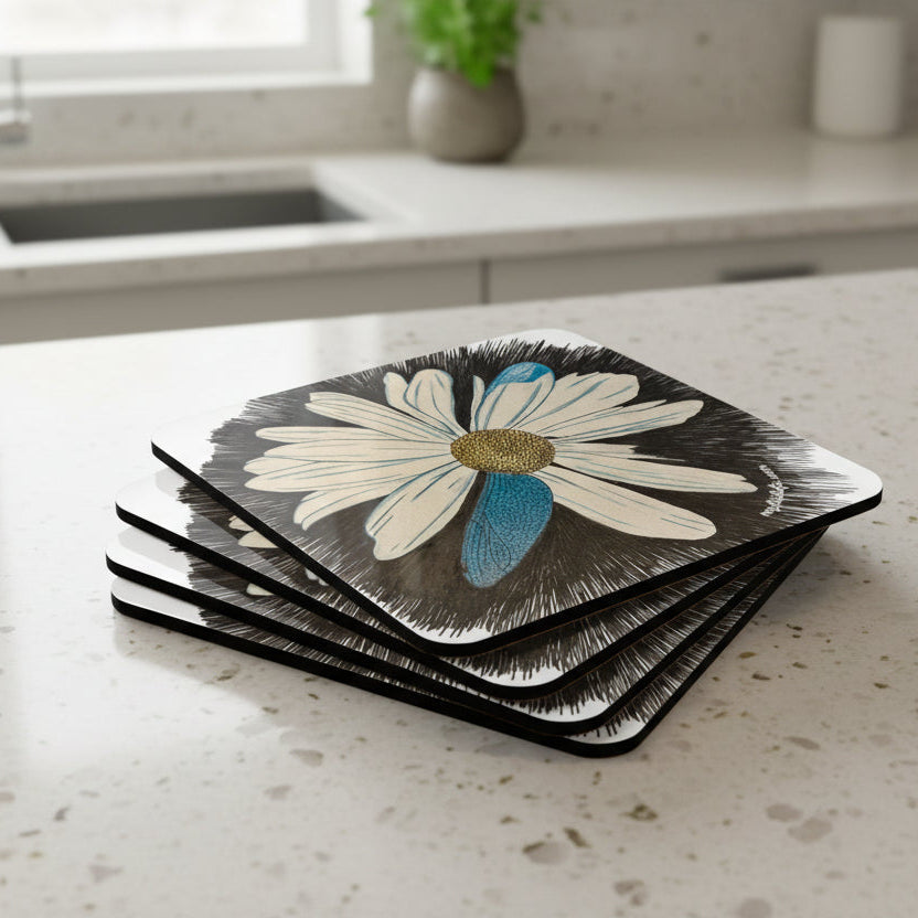 Set of four coasters with a Daisy Dragonfly design oon a kitchen counter