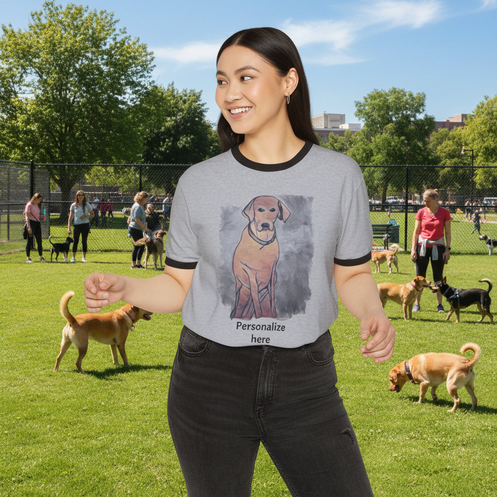 Woman wearing a gray t-shirt with a dog drawing at a dog park