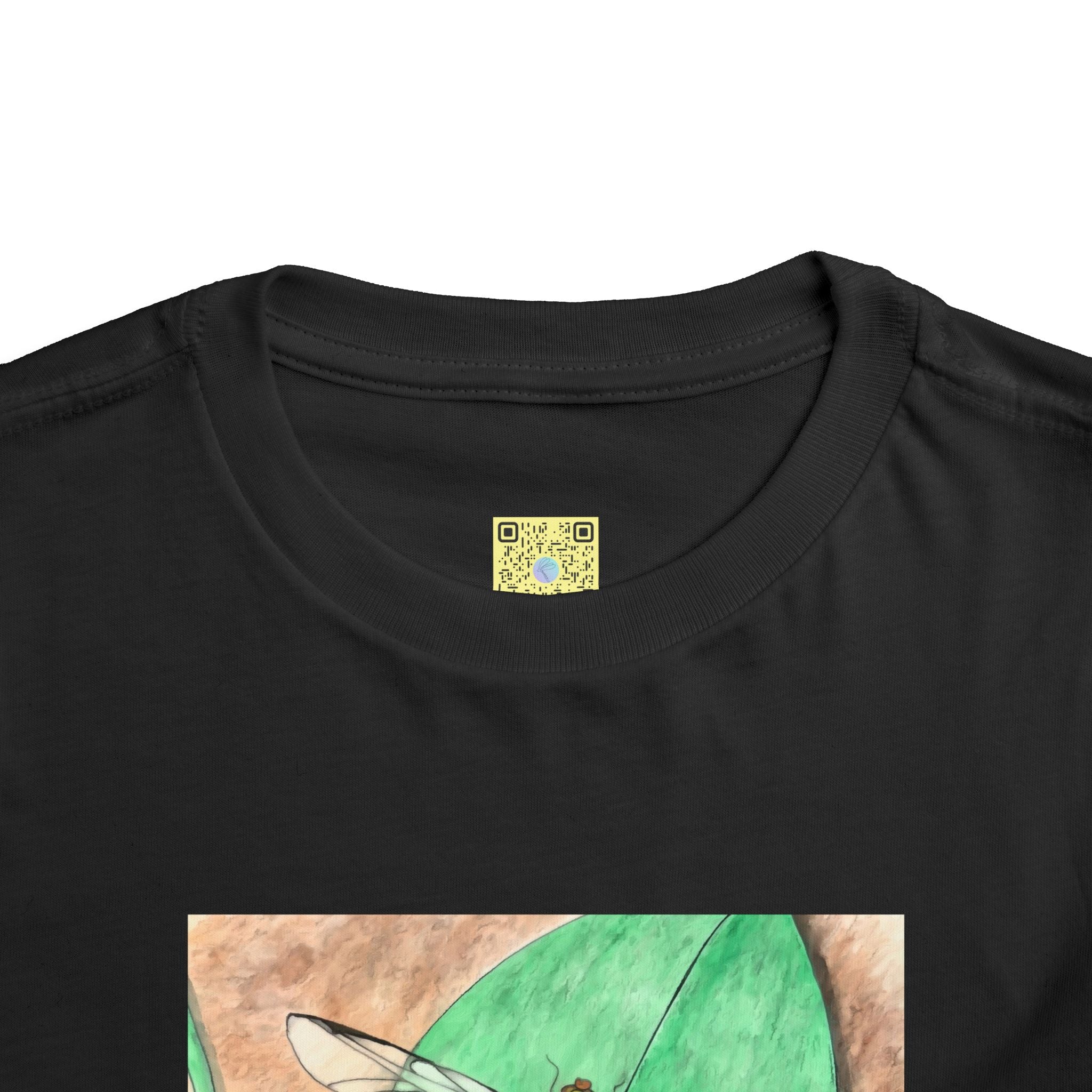 Black t-shirt with a dragonfly design and QR code label on a white background