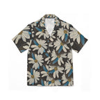 A short-sleeve button-up camp shirt with an all-over daisy floral print on a dark charcoal background. The print features white daisies with tan centers and light blue accents.