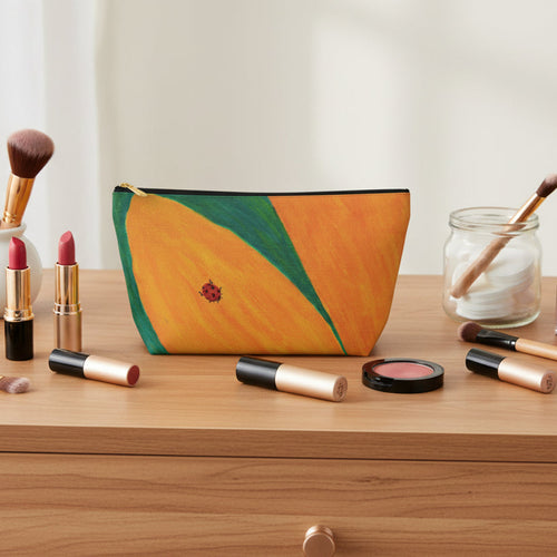 Ladybug on a Sunflower with green leaf design on a dresser with makeup next to it