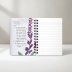 Opened Notebook with lavender design and text on a white background