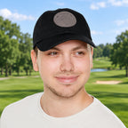 Man wearing a black cap with a logo of My Little Fe and a Dragonfly Stick drawing on a golf course