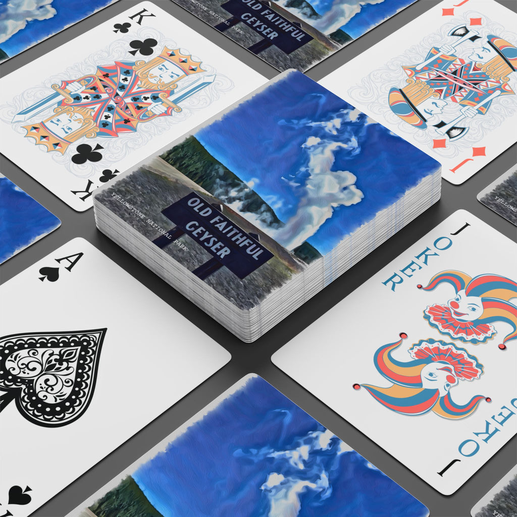 Playing cards with scenic design on a gray surface