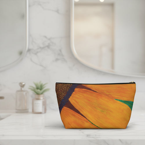 Pouch with a sunflower design on bathroom banity