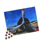 Jigsaw puzzle with airplane propeller design on a white background