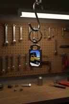 Vintage Truck keychain hung on a hook in a garage work area