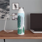Water bottle with Yosemite Falls Design on a desk next to a laptop.  Designed by Marife Rosales