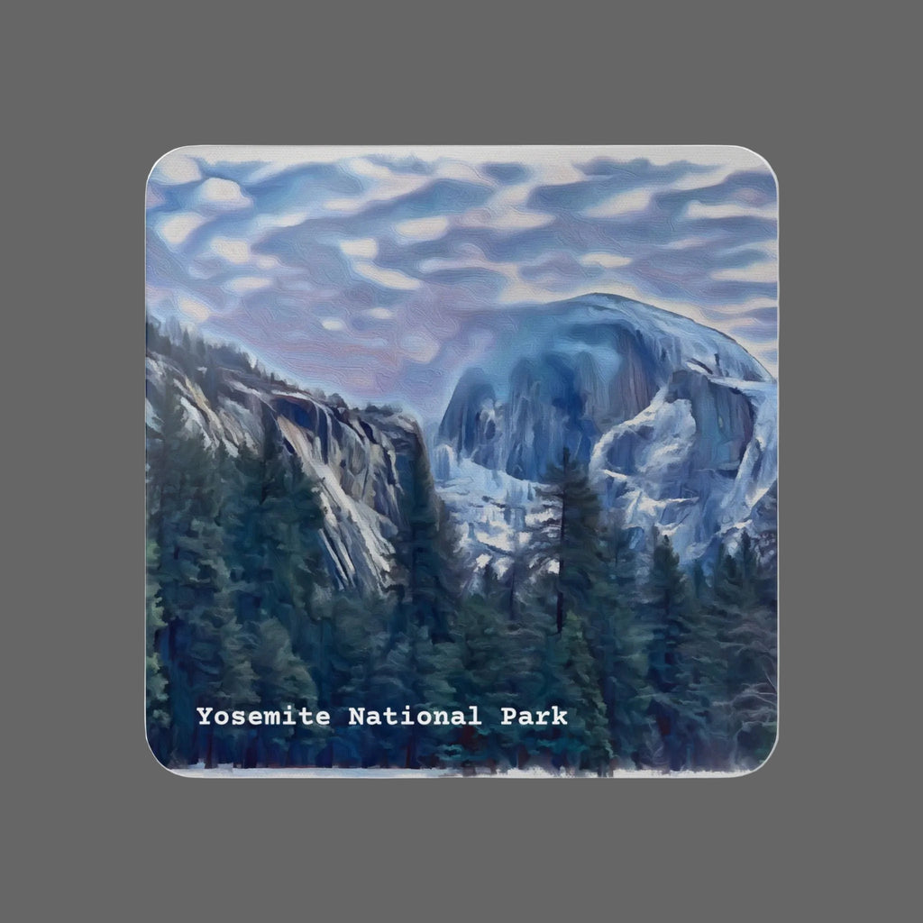 Coaster with a scenic design of Yosemite National Park featuring mountains and trees.
