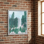 Framed artwork of pinetrees in Yosemite with a waterfall on the background