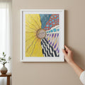 Zentangle Sunfloer Journey Jigsaw Puzzle framed hung on a wall with a hand holding it