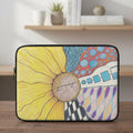 Zentangle Sunflower laptop sleeve at a desk in a home office
