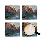 Four coasters with Zion National Park design and a latte on one coaster.