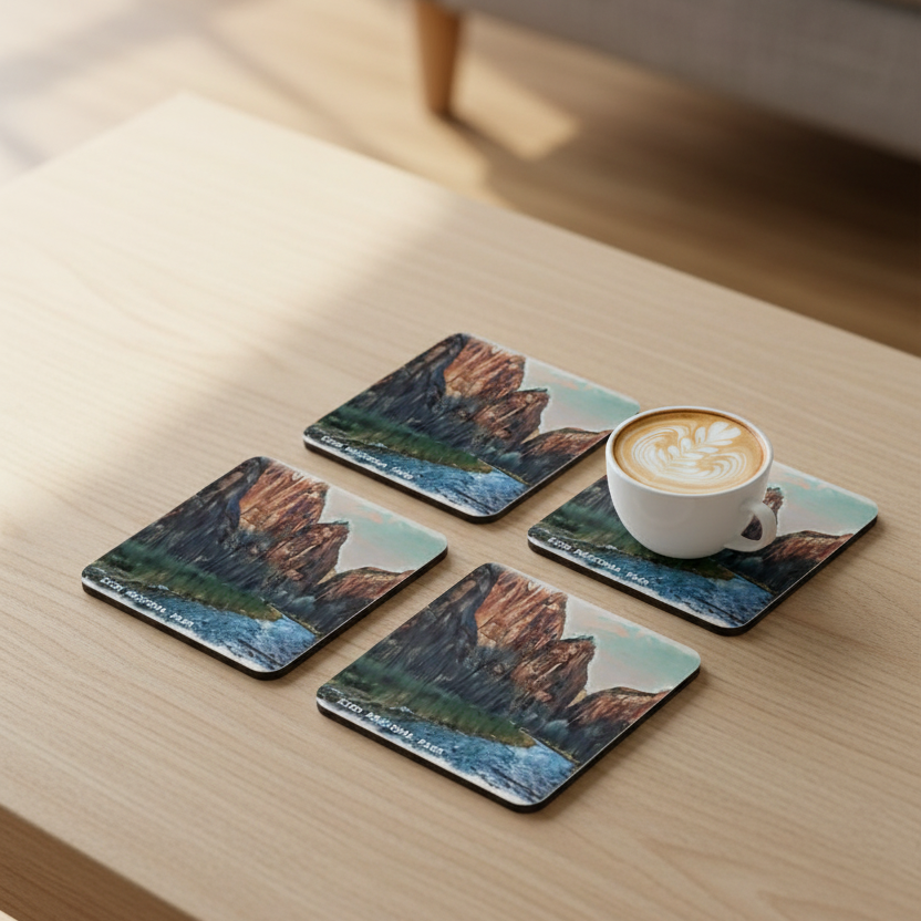 Zion National Park Coaster set with a coffee sitting on one of them on a coffee table.  Designed by Bay Area Artist Marife Rosales